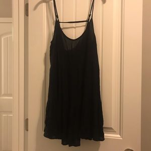 Flowy lace detailed open back little black dress